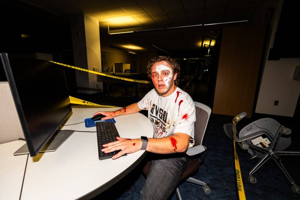 Zombie sitting at computer